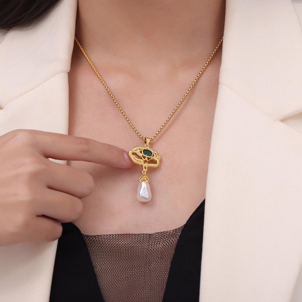 French Elegant Double-Headed Snake Freshwater Pearl Copper Pendant Necklace with Gold Plating and Inlaid Diamonds for Women.