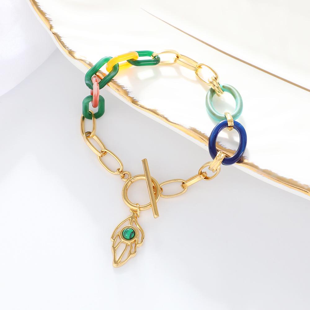 

Ожерелье с подвеской из сусального золота и модный браслет из титановой стали