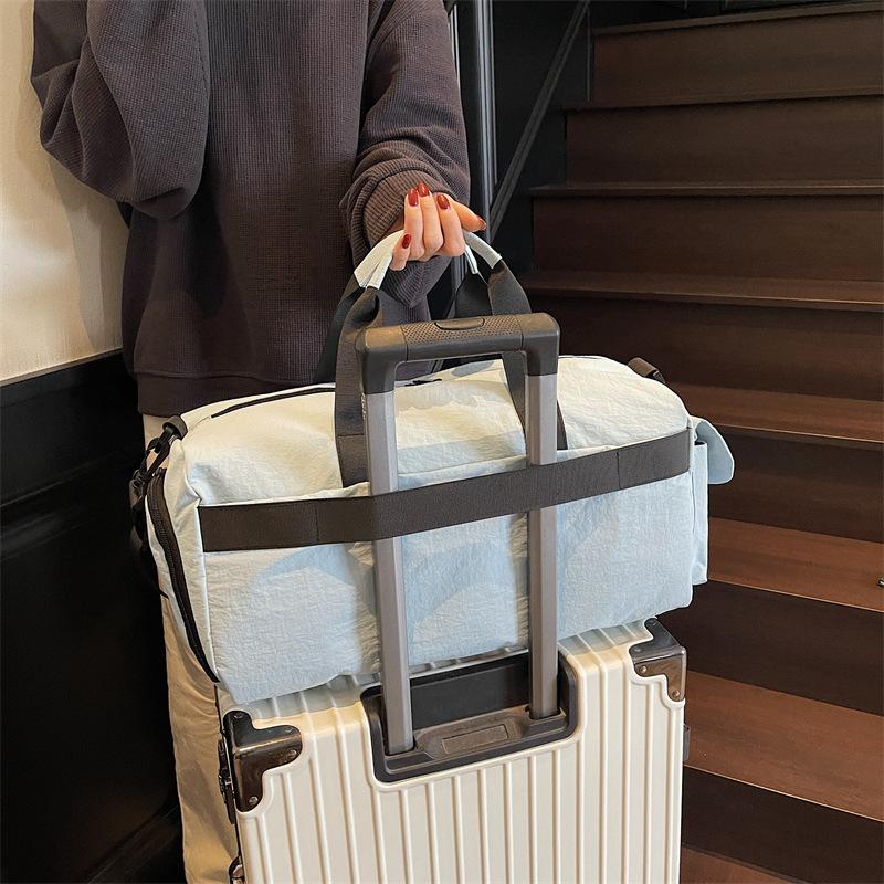 Large-capacity travel bag, new model with dry and wet separation, pleated storage bag, independent shoe compartment, travel sports and fitness bag