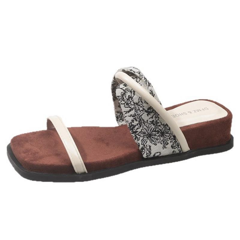 Slope heel one-word slippers for women's summer wear, new design sense, niche with skirt, thick-bottomed cool slippers for women