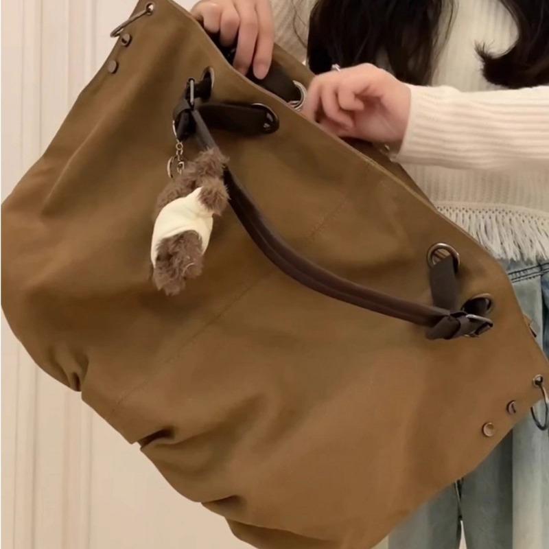 Tote Bag with Large Capacity and Multiple Pockets, for Commuting, with A Single Shoulder Strap and A Slanted Design.