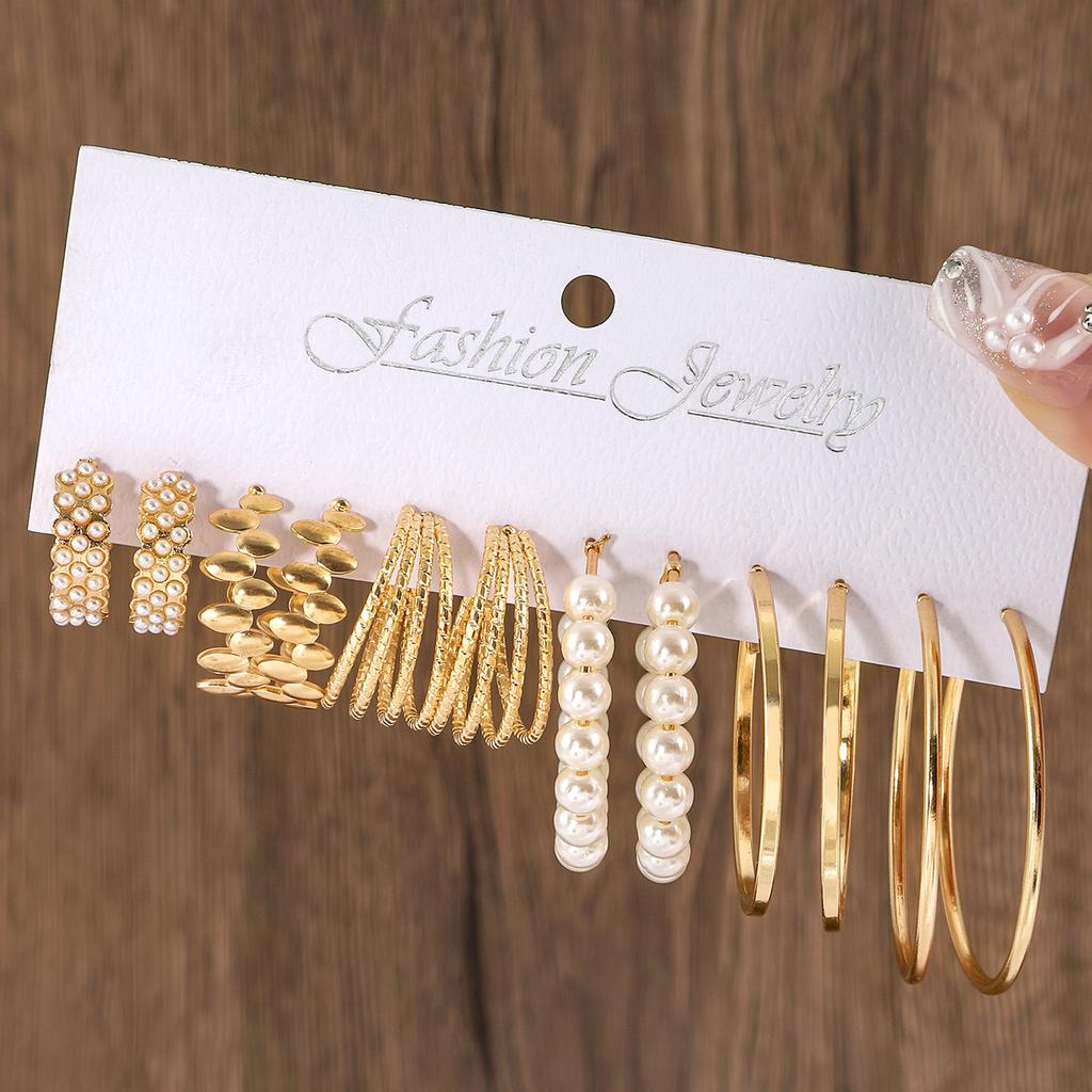 European and American new earrings set 1 pair of golden metal twist pearls creative retro simple and versatile earrings