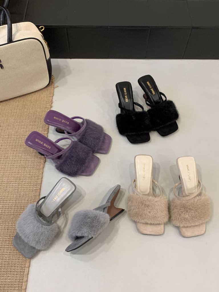 In the autumn and winter of 2025, the new European and American wedges with French square head open-toed fluffy slippers are worn outside women's sh