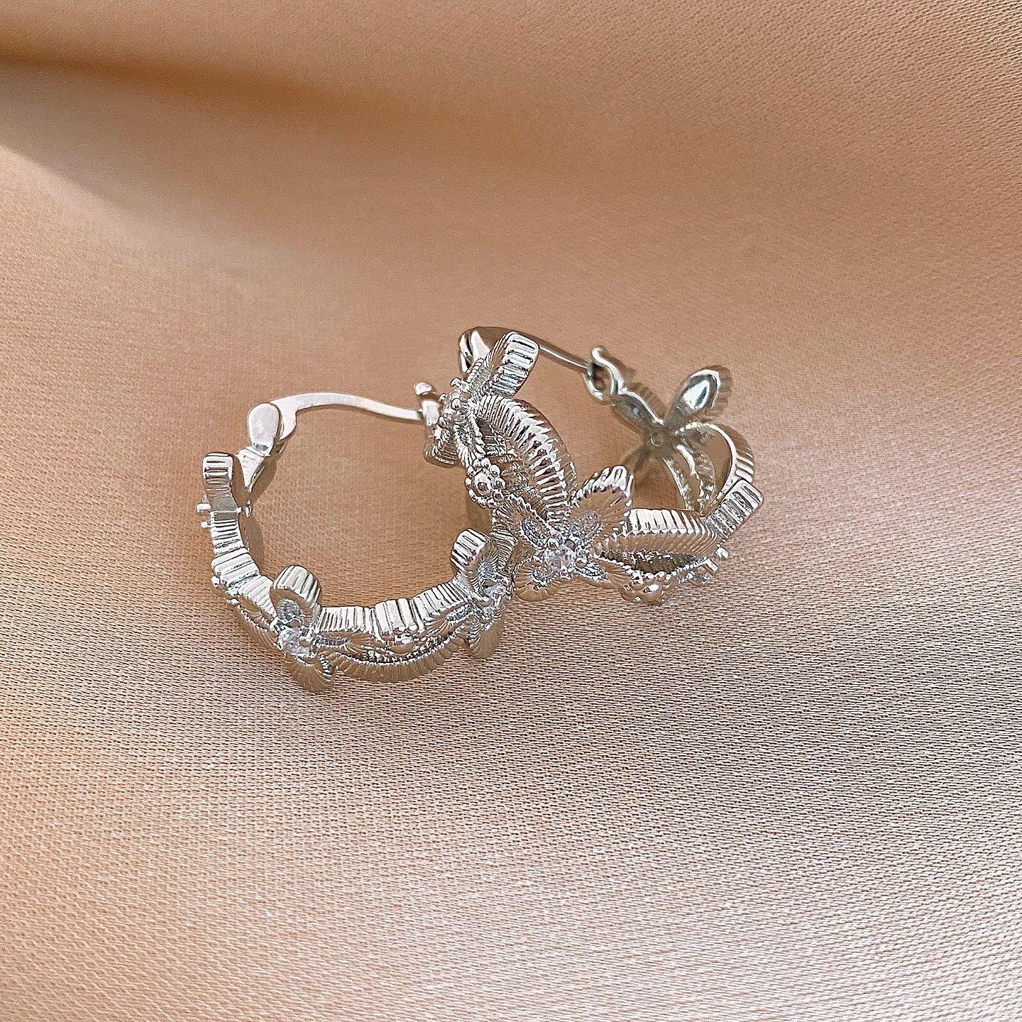 Cold wind zircon geometric hollow flower earrings ear buckles simple and versatile earrings