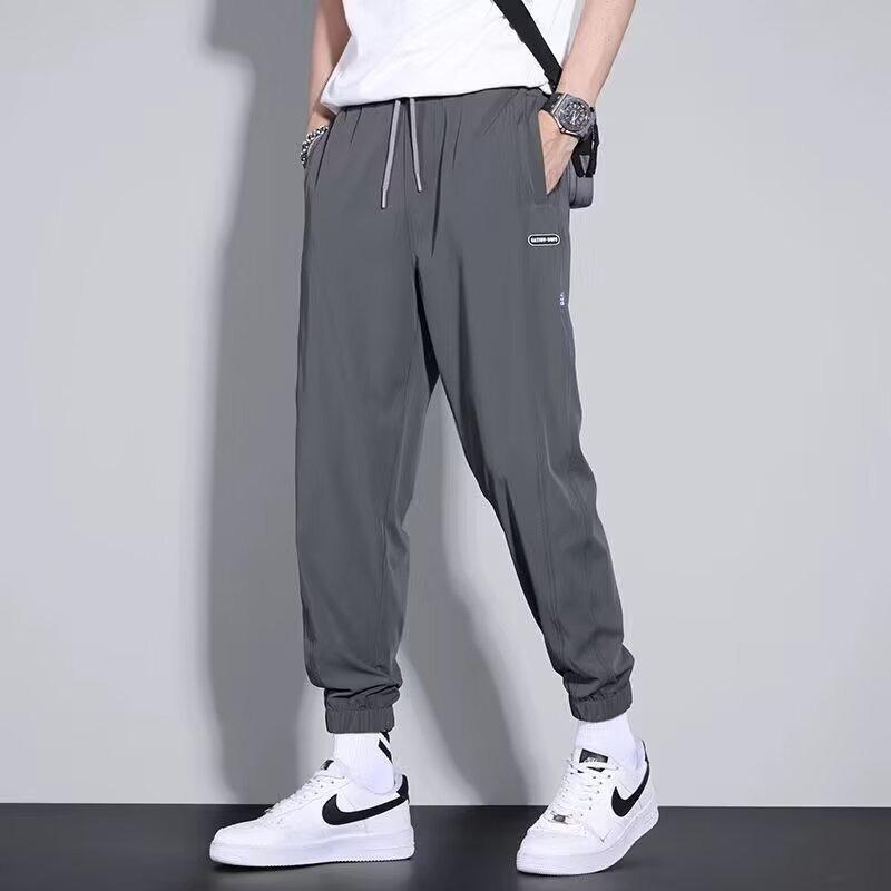Men's casual pants elastic, loose, simple and comfortable, young students slim-fitting small feet and trousers
