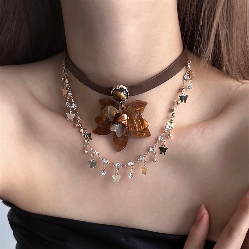 Diamond leather tiger's eye stone butterfly flower pendant necklace personalized retro light luxury neck chain niche temperament jewelry women
