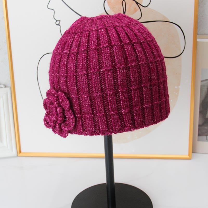 Three-dimensional flower knitted headgear women's autumn and winter face small warm windproof cold hat ear protector wool hat pullover hat