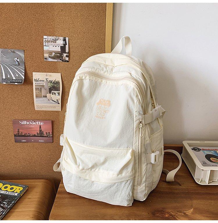 Schooltas Effen Kleur Eenvoudig Outdoor Stijl Rugzak Vrouwelijk Design Gevoel Niche Lichtgewicht Schooltas Kleine Rugzak voor Basisschool en Middelbare School