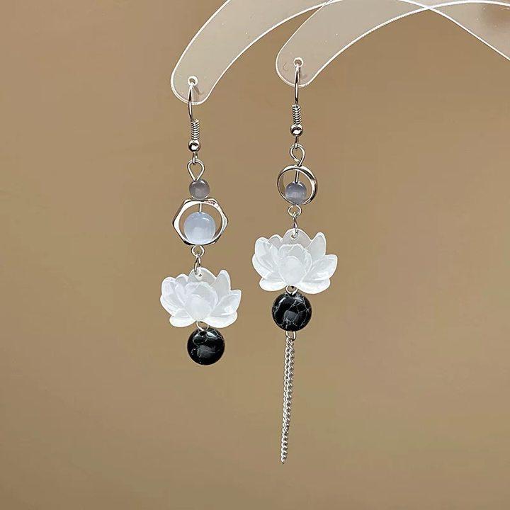 

Геометрические серьги в древнем стиле: Элегантный дизайн для женских аксессуаров к ципао