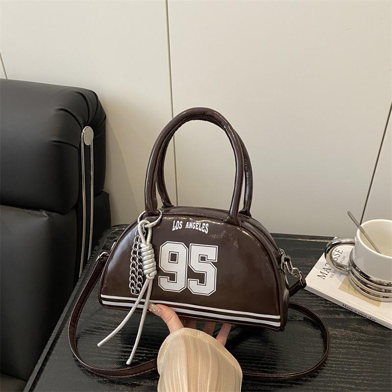 Bag women's new bowling bag fashionable oily leather splicing contrasting color digital decoration portable women's handbag