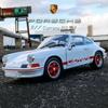 Welly 1/24 Porsche 911 Carrera RS Alaşım Spor Araba Modeli Döküm Metal Oyuncak Yarış Araçları Araba Modeli Simülasyon Çocuk Hediye