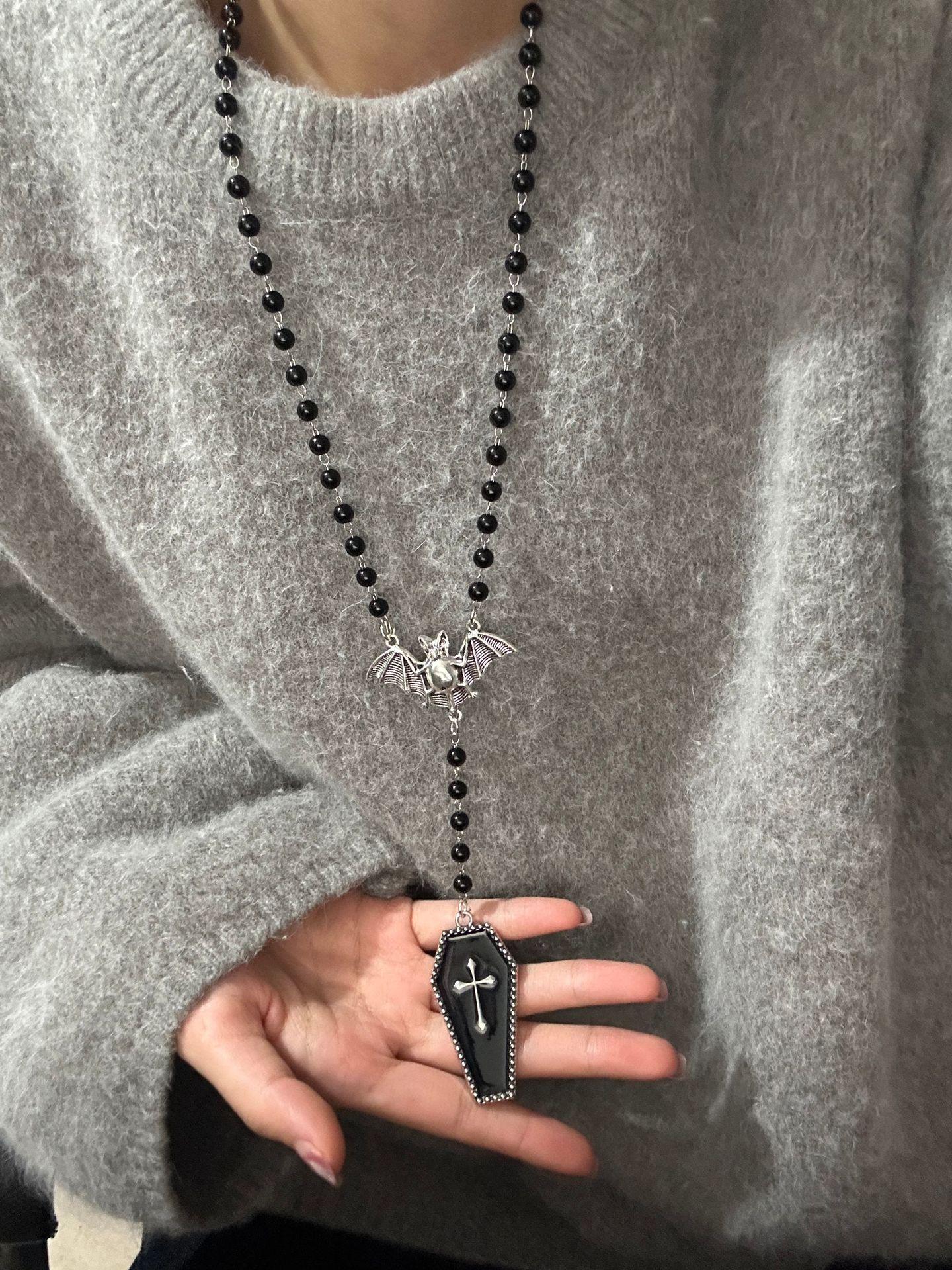 

Gothic Y2K Cross Pendant Necklace: High-End Retro Bat & Bead Chain