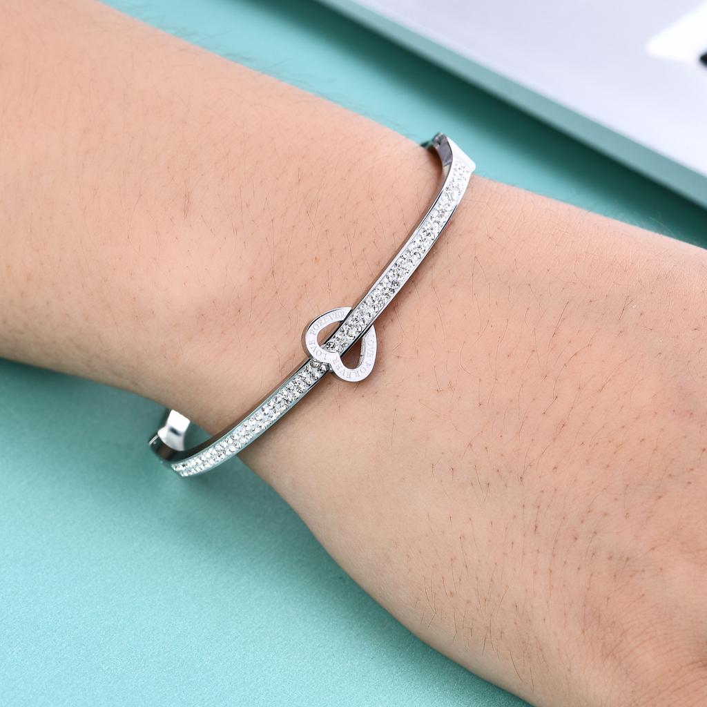 Zwei Reihen eingelegter Zirkonium-Liebes- und Valentinstagsgeschenke können als Armband mit offenem Ende gestaltet werden