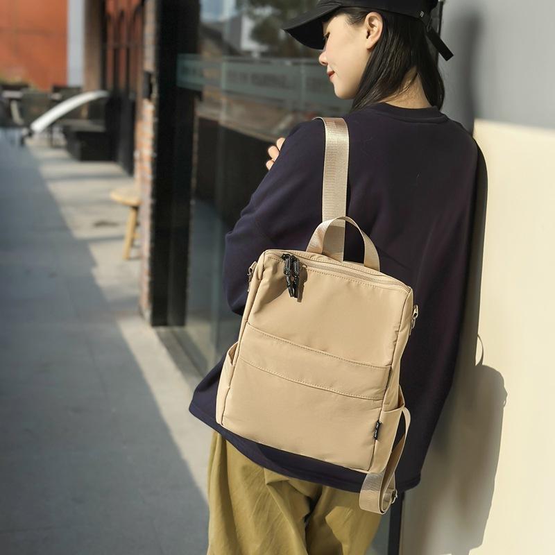 Large-capacity waterproof nylon backpack, small backpack, high-end, ultra-light, literary artistic simple and versatile backpack for college students