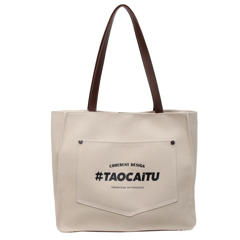 

Women s bag new commuter large-capacity canvas bag single shoulder women s shopping bag