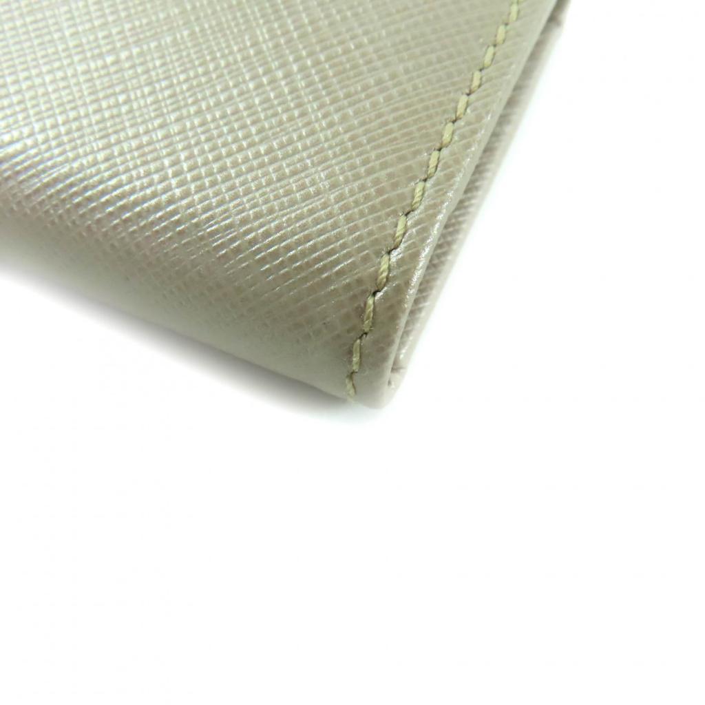 Excellent Porte-clés Salvatore Ferragamo Cuir Doré Champagne Femme 224627 Occasion