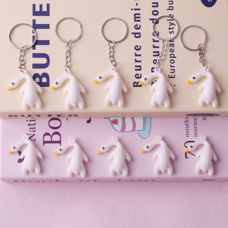 Duck Keyring UV Color Changing Fluorescent Glow-in-the-Dark Key Holder