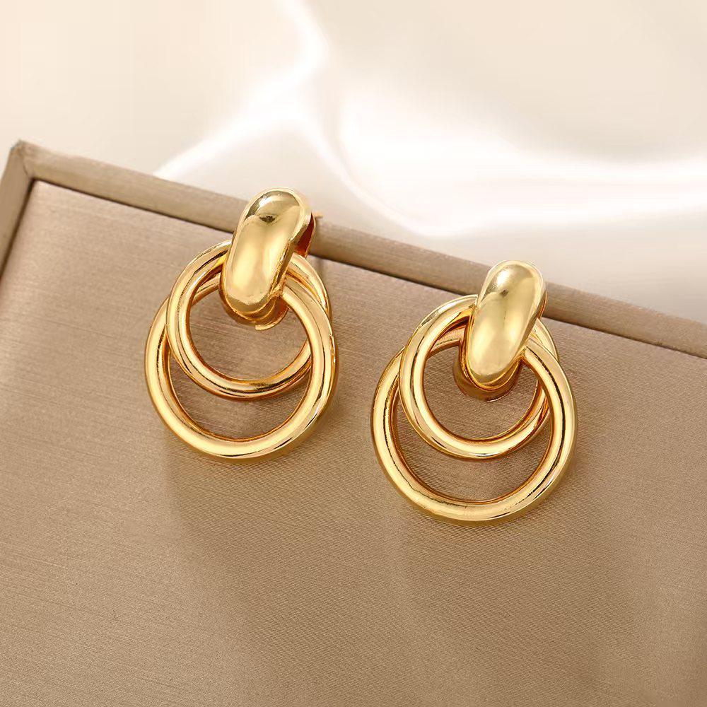 Europäisch-Amerikanische Geometrische Twist Kreis Ohrringe – Stilvoll, Mehrschichtig und Vielseitig