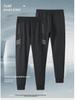 Pantalones deportivos con puño para hombre con bolsillos, cremallera y características antirrobo - Pantalones de chándal casuales para entrega transfronteriza