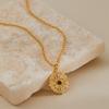 Gold Plated Sun Embossed Disc Pendant Necklace With Turquoise Center