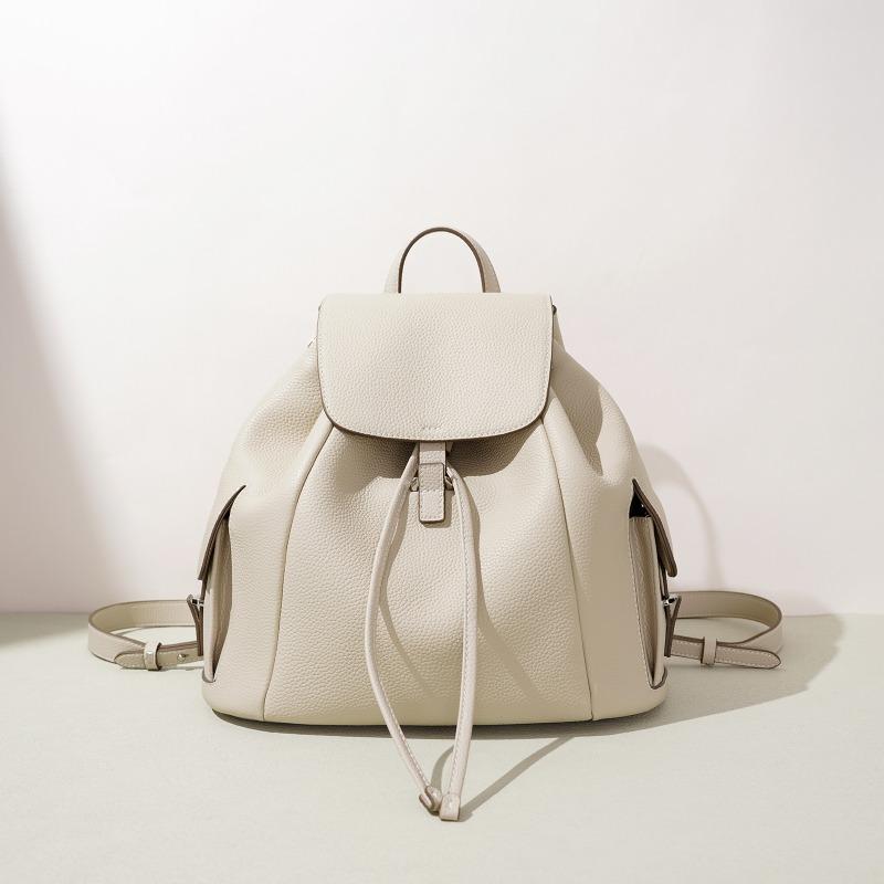 Japan and Korea Casual Drawstring Flip Backpack Women's Early Spring Niche Literary Style Commuting Portable Leather Women's Bag