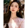 European and American Style Retro Metal Sunflower Earrings for Women 2026 New Niche Minimalist Style Hoop Earrings Exaggerated Ear Accessories