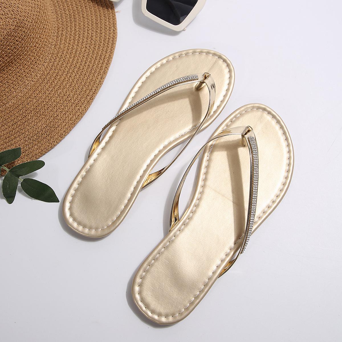 

2025 лето новые модные шлепанцы со стразами женские простые с перемычкой большого размера на плоской подошве пляжная обувь 43 золотой