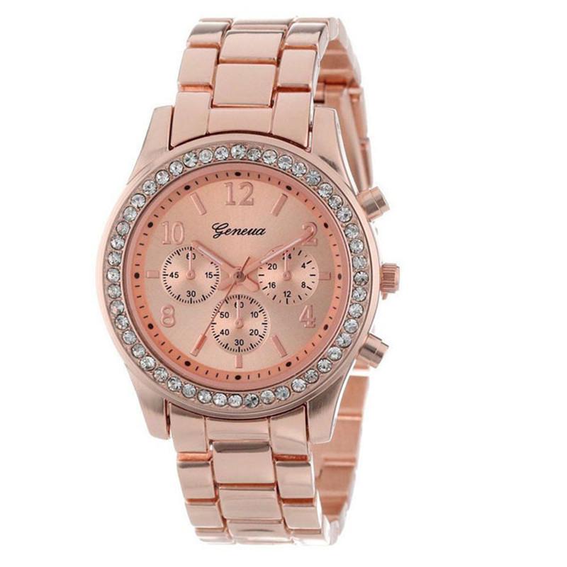 Geneva Rhinestone Ladies Watch with Steel Band and Decorative Three-Eye Design