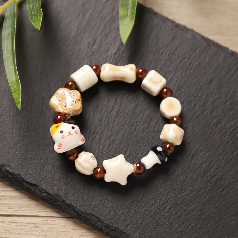 

Creative ceramic cat bear beaded bracelet dopamine color small fresh color retro literary bracelet women