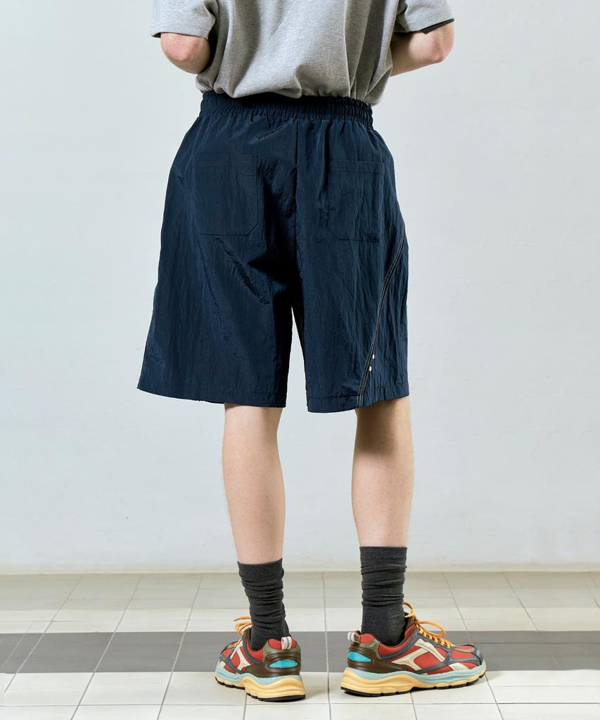 Singkeu Unbalance Track Bermuda Pants Navy