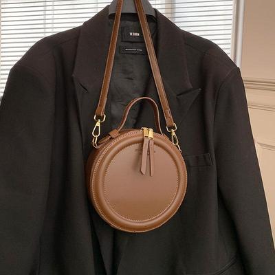 Sac à bandoulière rond tendance pour femme, couleur unie, petit format, en cuir PU, design polyvalent
