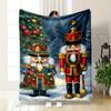 Two Festive Nutcracker Figures, One In Red and One In Blue, In Snowy Scenery. for All Seasons Blanket Lunch Break Throw Gift