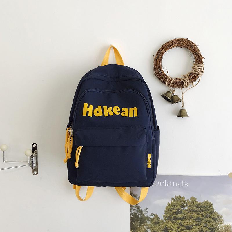 

Новый высококачественный однотонный простой рюкзак с надписью, парный, повседневный, легкий, большой вместимости