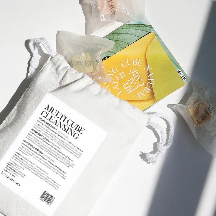 A Soothing Moisturizing Layering Cube That Builds Up Like Vitamins On the Skin. 160g Cream Soothing Barrier Composition and Cotton Pouch and Bubble