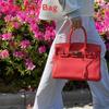 Leather Handbag With Silver Lock For Elegant Women Day Use