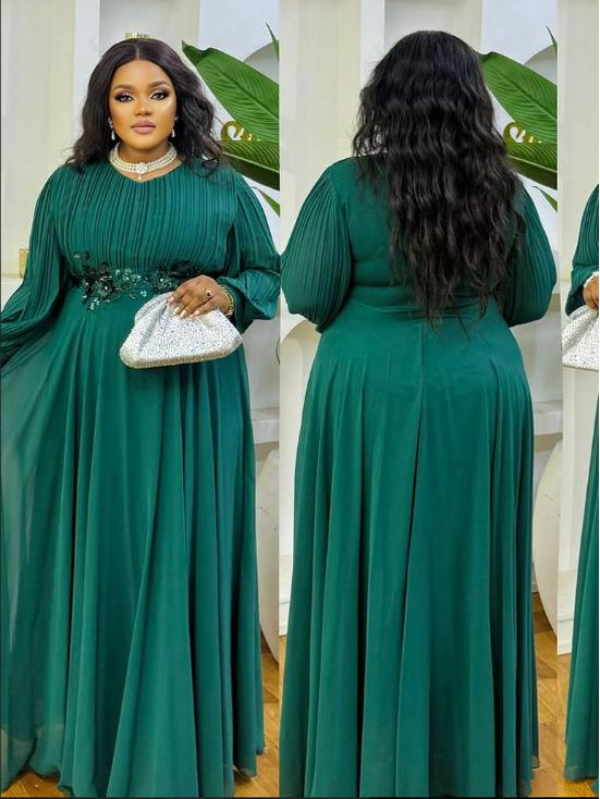 Plus Size Emerald Green Sequin Waist-Cinched Long Pleated Dress with Wide-Hem Skirt and Long Sleeves for Formal Banquets.