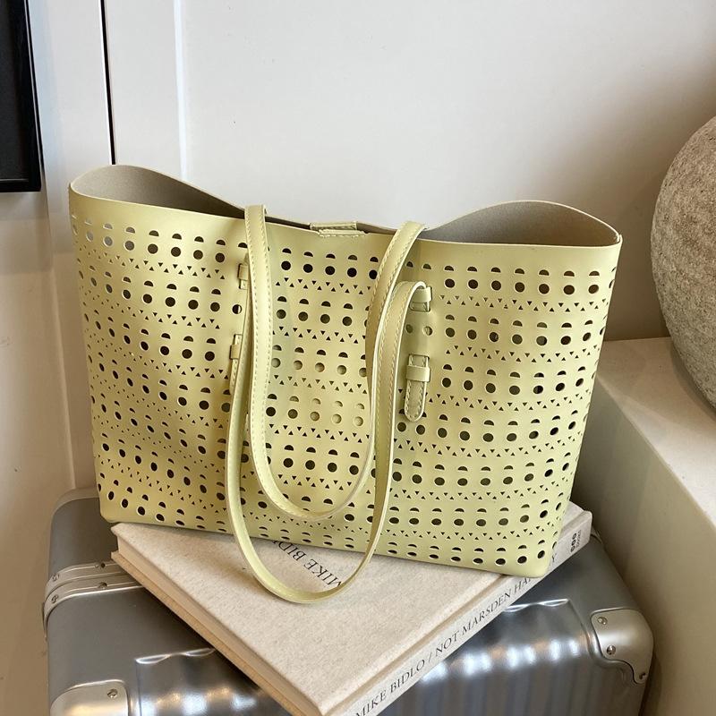 2025 spring and summer new niche high-end hollow tote bag large-capacity temperament commuting single shoulder child and mother bag