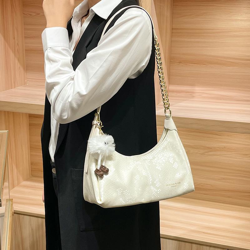 Knödelförmige Umhängetasche mit einem Unterarmgurt, Eine hochwertige und Nischen-Damen-Crossbody-Tasche