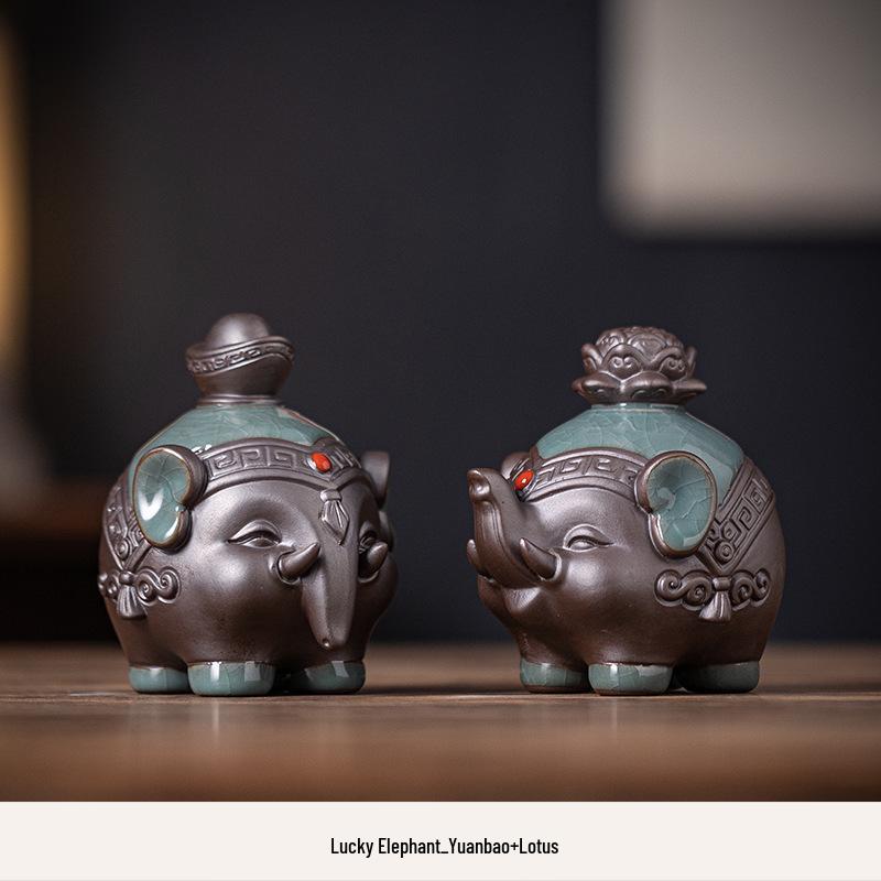 

Керамические фигурки слонов - приносящий богатство домашний декор для гостиной, винного шкафа или фойе.