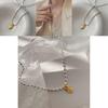 Trendy Gold Oval Love Letter Pendant Necklace For Women Perfect For Casual And Formal Wear