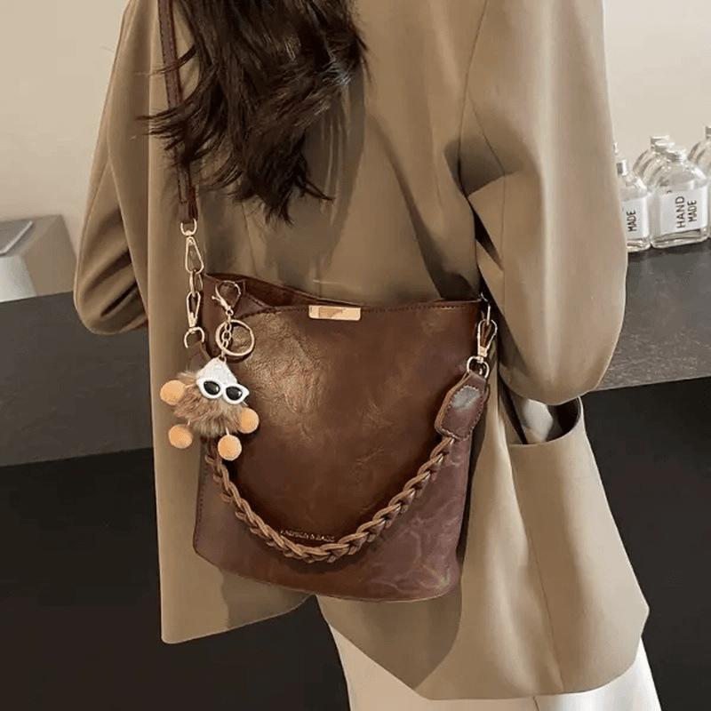 

This year, popular bags, bucket bags, women s new retro messenger bags, go to work, small bags, niche coffee colors