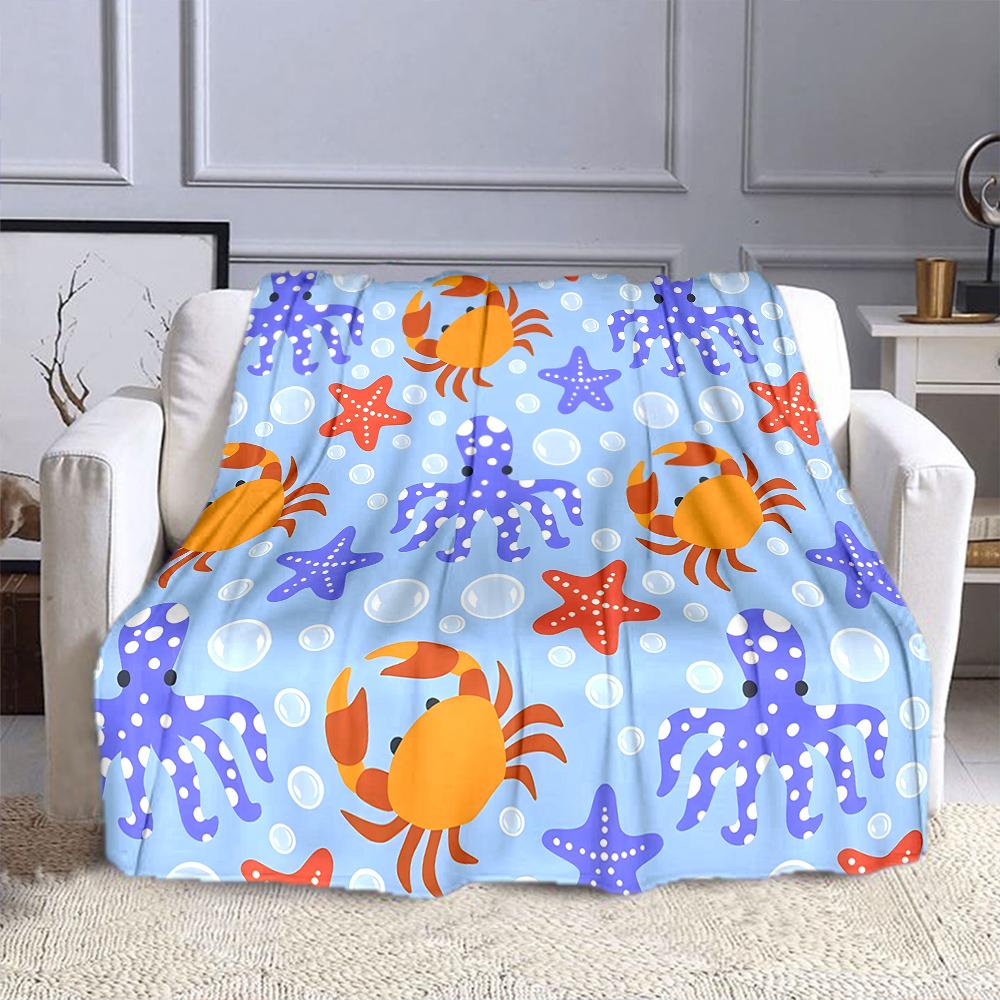 Ocean Creatures Pattern on Blue Patterned flannel blanket perfect for the bedroom living room, sofa, or a little nap