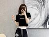 Elegant Women's Summer Casual Suit: Stylish Wide-Leg Pants Two-Piece Set for an Age-Reducing Street Style.