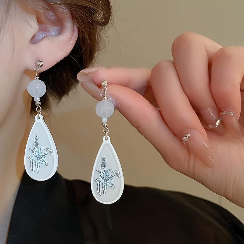 

Винтажные серьги с цветочным принтом - идеально подходят для повседневного ношения и подарка.