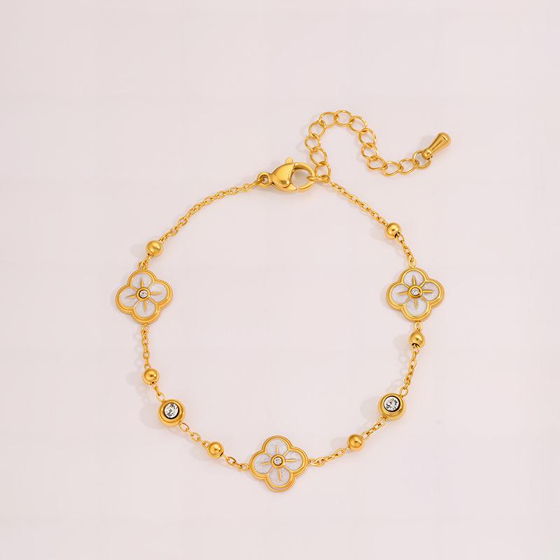 Elegant Women's Titanium Steel Bracelet with Diamond-Embedded Four-Leaf Clover and Eight-Pointed Star Design