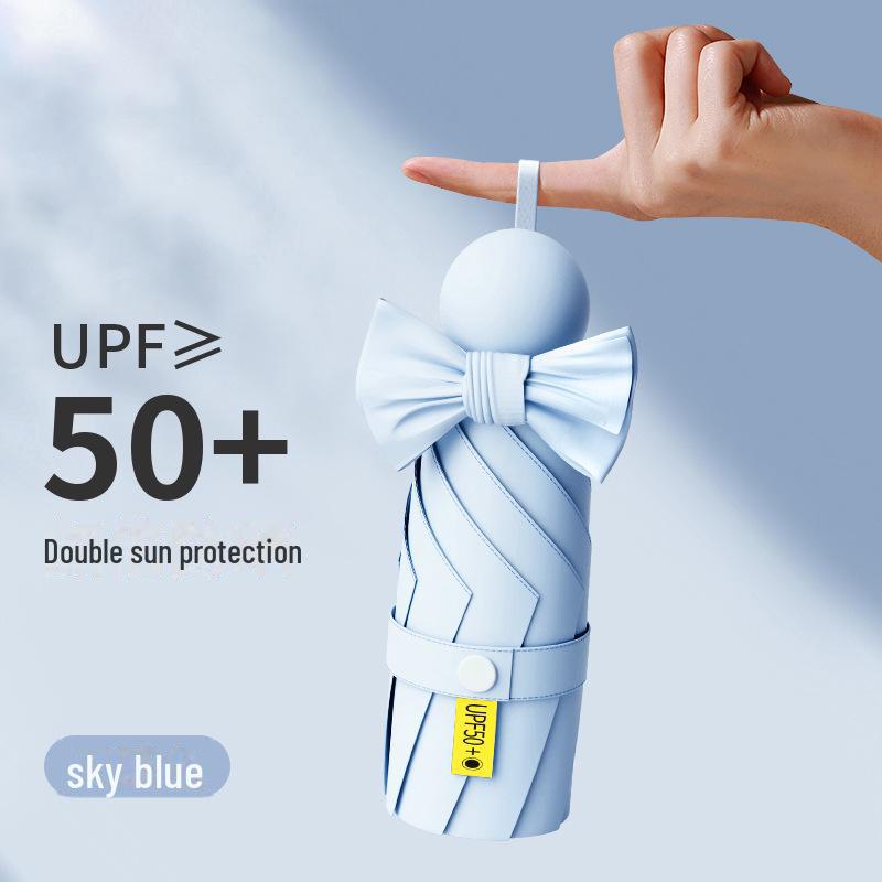 Compact Capsule Umbrella: 50% Foldable, Portable, Pocket-Size for Sunny and Rainy Days