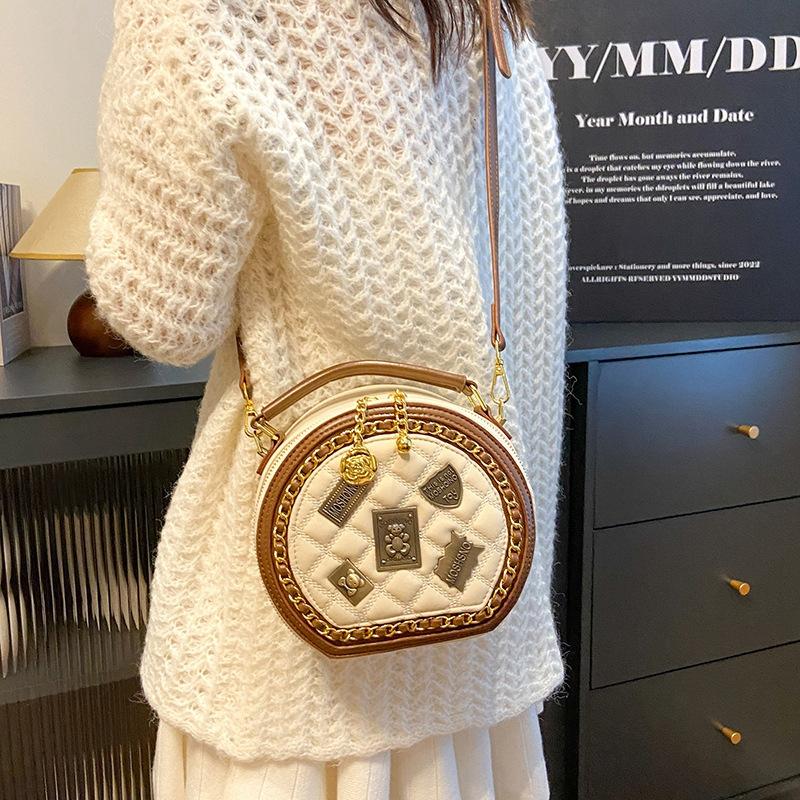 Xiaoxiangfeng Tasche 2025 neue koreanische Version Mode personalisiertes Splicing Trend Einzel-Schulter Damen Umhänge kleine runde Tasche
