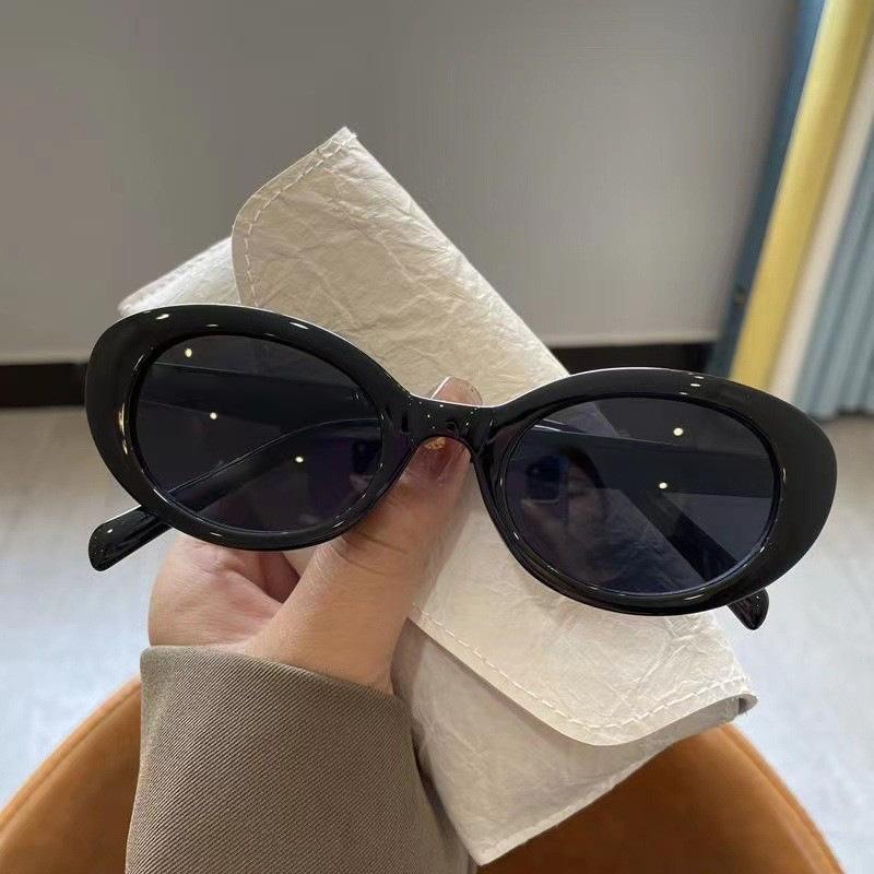 

Korean-style influencer sunglasses, egg-shaped small-face sunglasses, high-end tea-colored UV protection glasses Black Frame Gray Piece