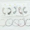 12-piece DIY kit for making a wish bracelet with a skein of macrame.
