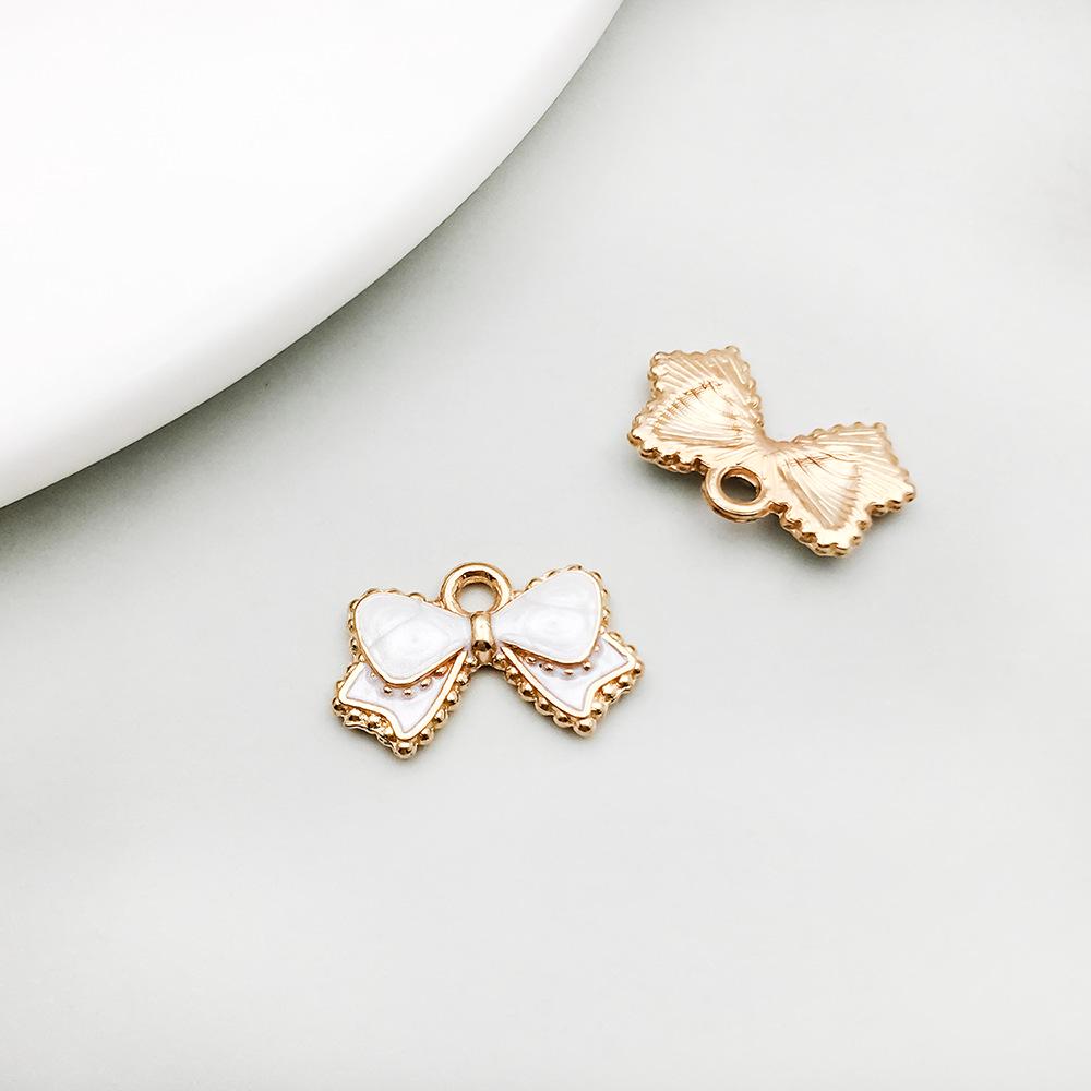 

Новая красочная подвеска-шарм в виде банта из сплава с капельной эмалью